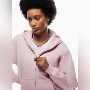 Tna aritzia pale Pink Hoodie neutrals basics essentials zip cozy af fleece 1 s